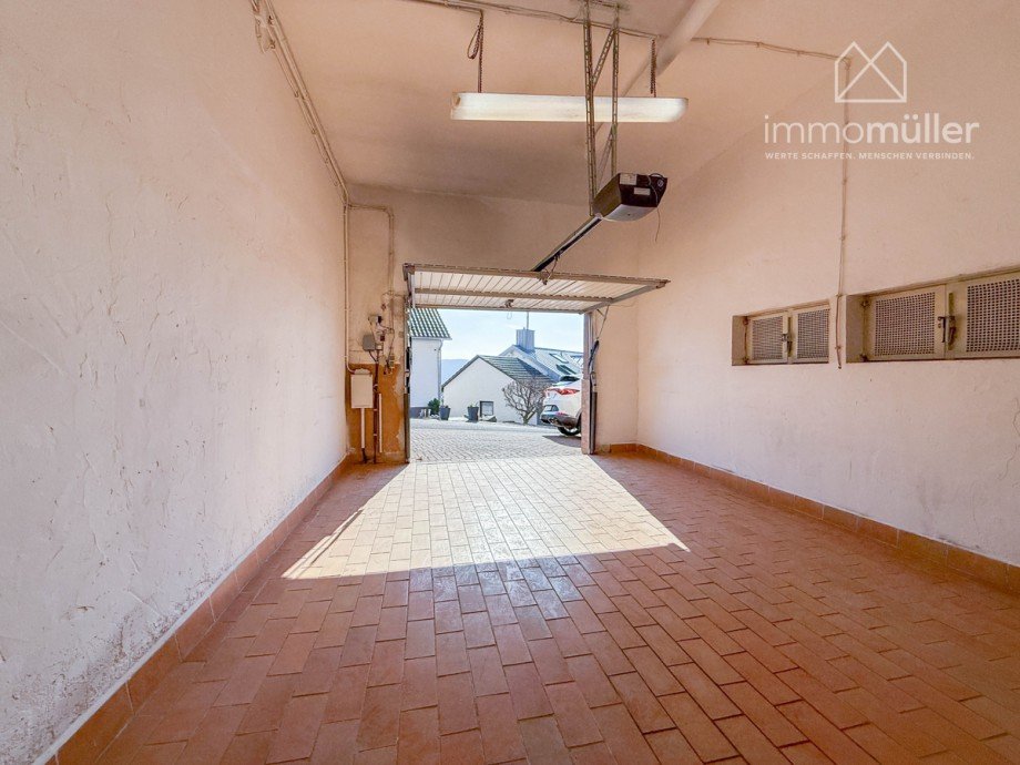 Garage Einfamilienhaus Eisenberg / Stauf